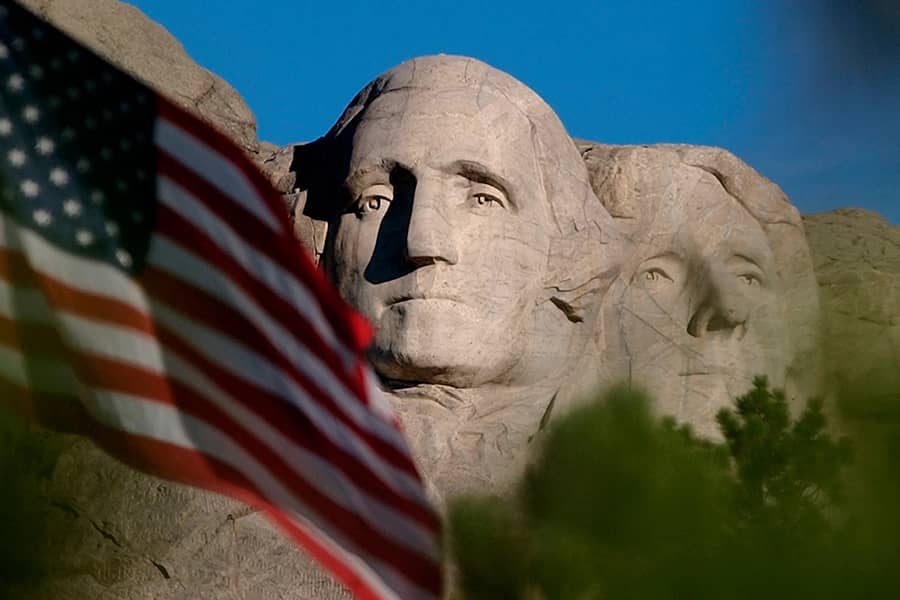 How many presidents' faces are carved into Mount Rushmore?
